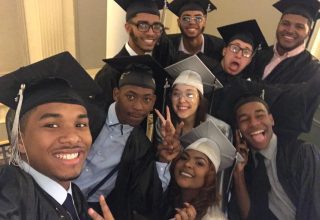 selfie of graduating students in caps and gowns